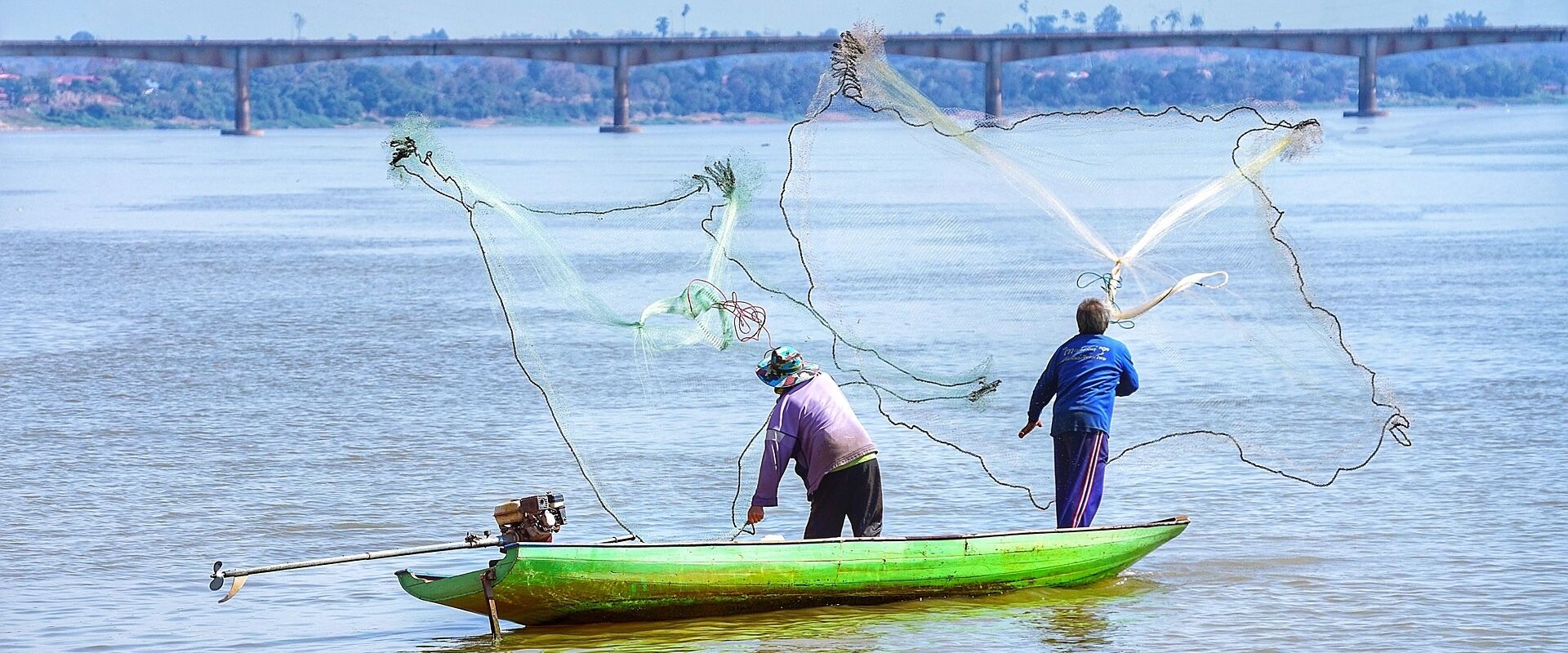Iconic Champasak Mekong landscape for a vibrant Champasak Travel banner with Legend Travel Group.